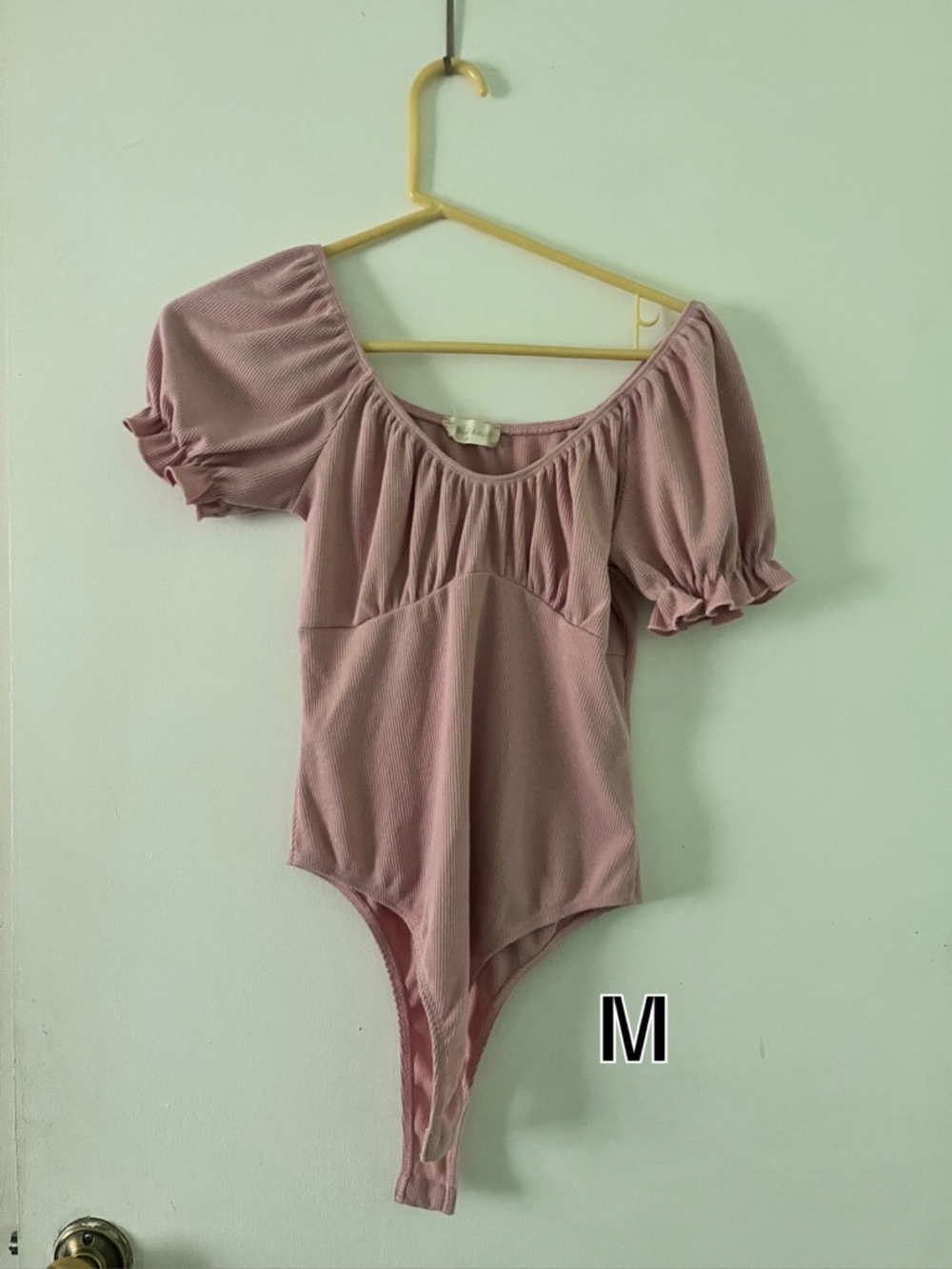 Pink bodysuit